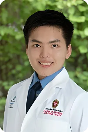 Portrait photo of Cuong P. Luu in white coat